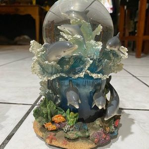 Dolphin snow globes. 2 light up and play music.